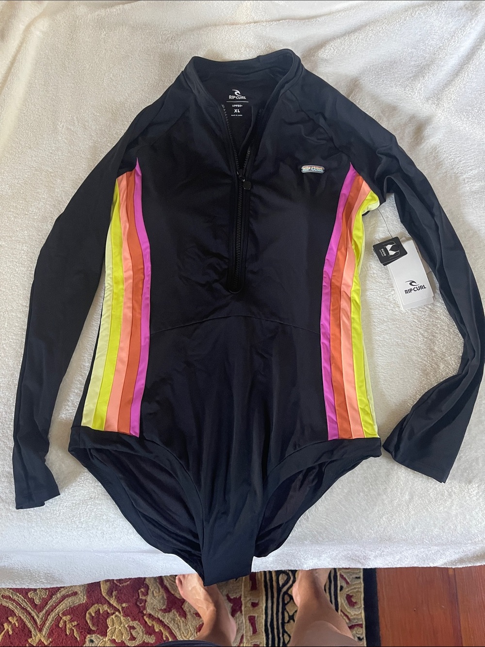 Rip Curl Black Long-Sleeve One-Piece Swimsuit with Neon Stripe Accents
